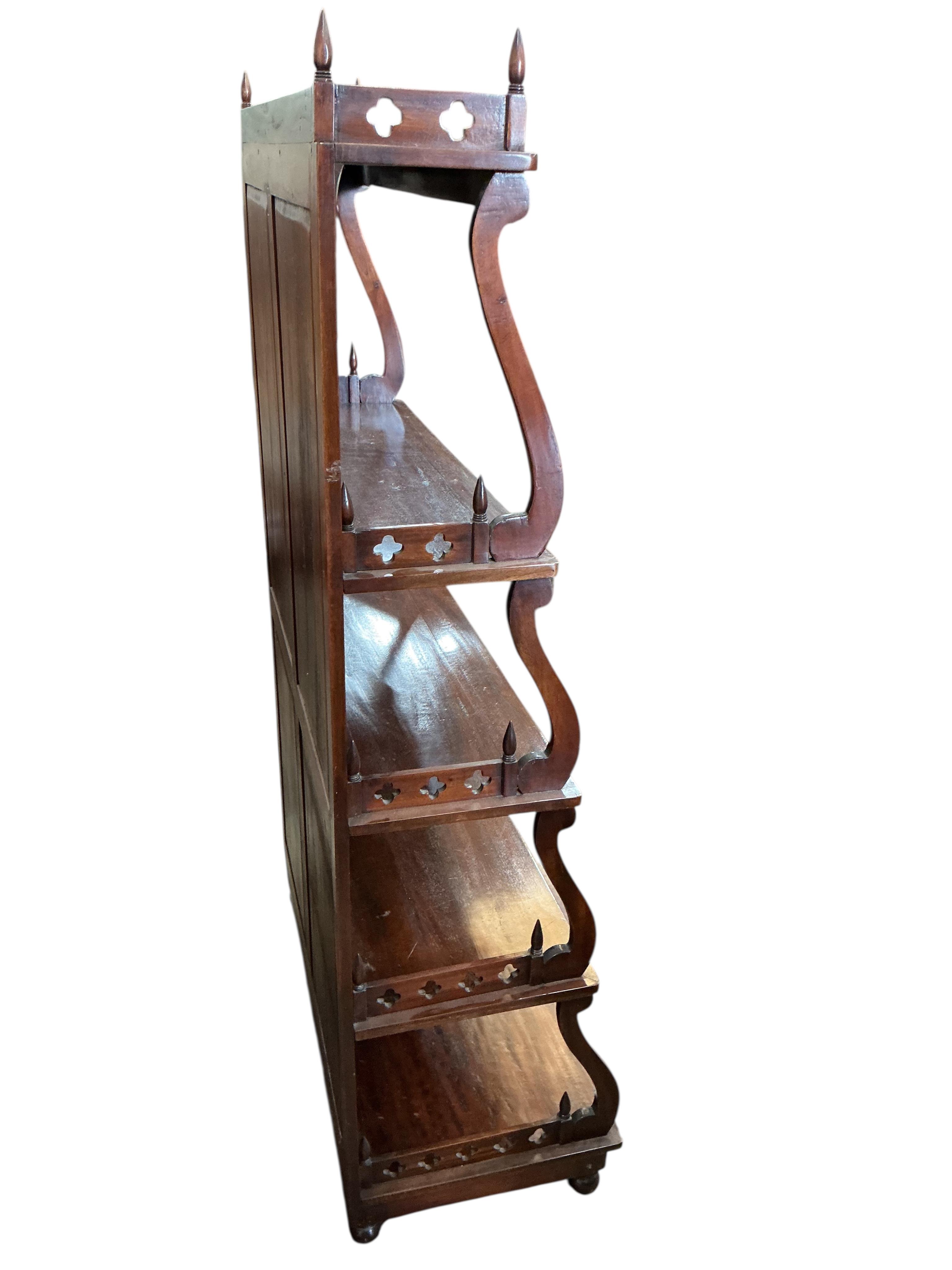 A Regency style mahogany graduated open bookcase, width 90cm, depth 41cm, height 164cm